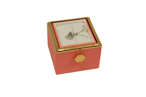 Boîte à bijoux rotative avec rose éternelle.